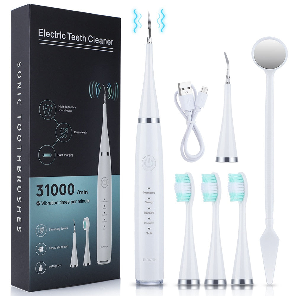 Newest Electric Toothbrush and Dental Scaler with USB charging, featuring multiple brush heads and waterproof design for effective oral care.