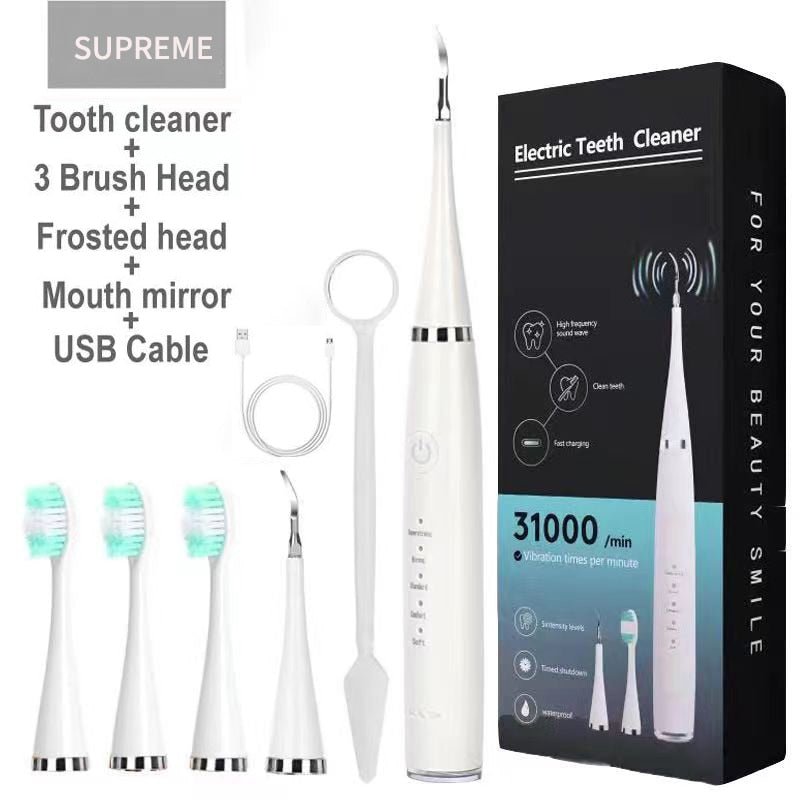 Newest Electric Toothbrush and Dental Scaler with USB charging, featuring multiple brush heads and waterproof design for effective oral care.