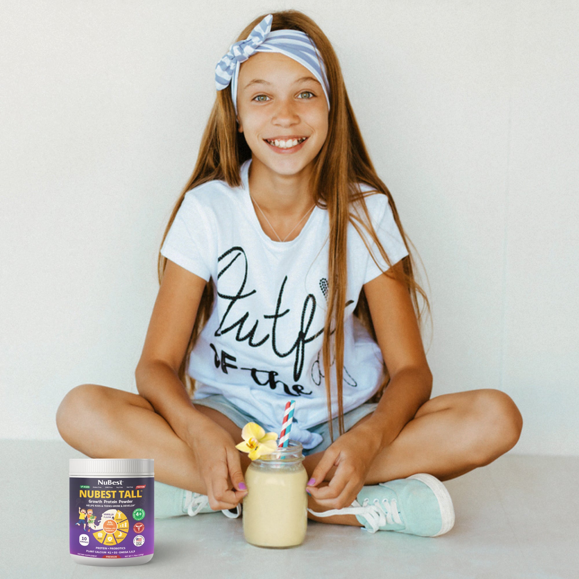 NuBest Tall Protein Vanilla Shake for kids, featuring a vibrant packaging design with nutritional information and a scoop for easy serving.