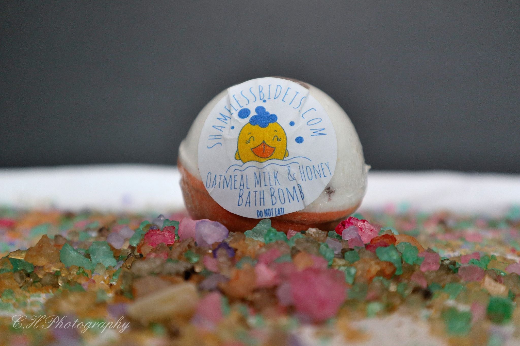 Bath bomb with colorful crystals.