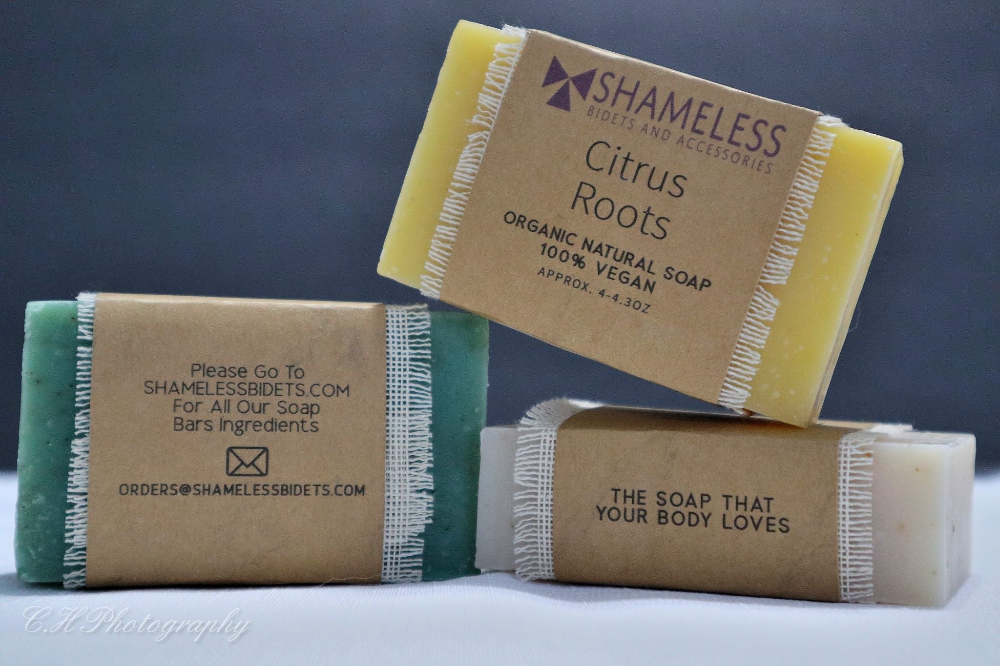 A bar of Organic Coconut Soap made with natural ingredients, showcasing its creamy texture and organic label.