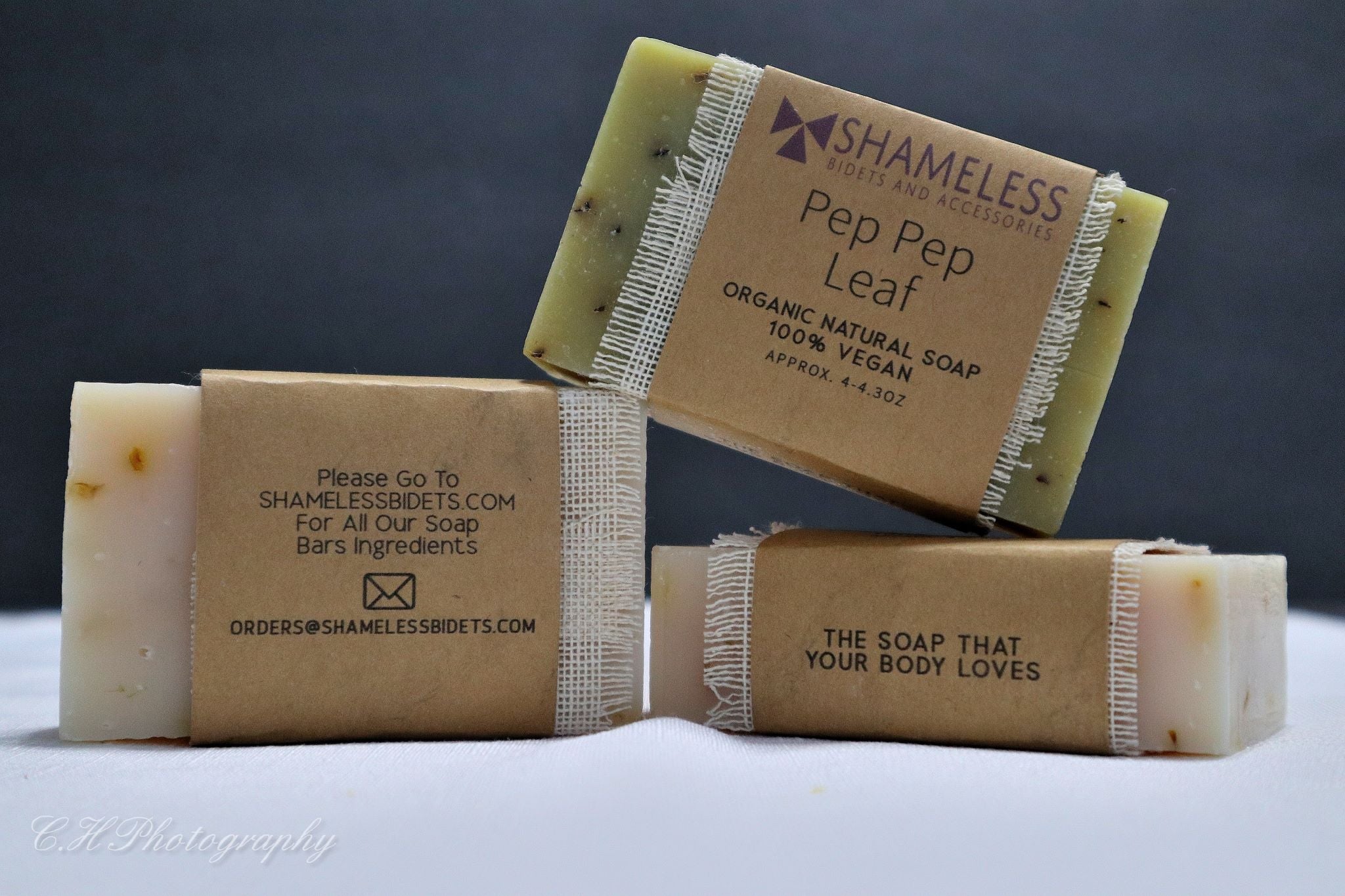 A bar of Organic Coconut Soap made with natural ingredients, showcasing its creamy texture and organic label.