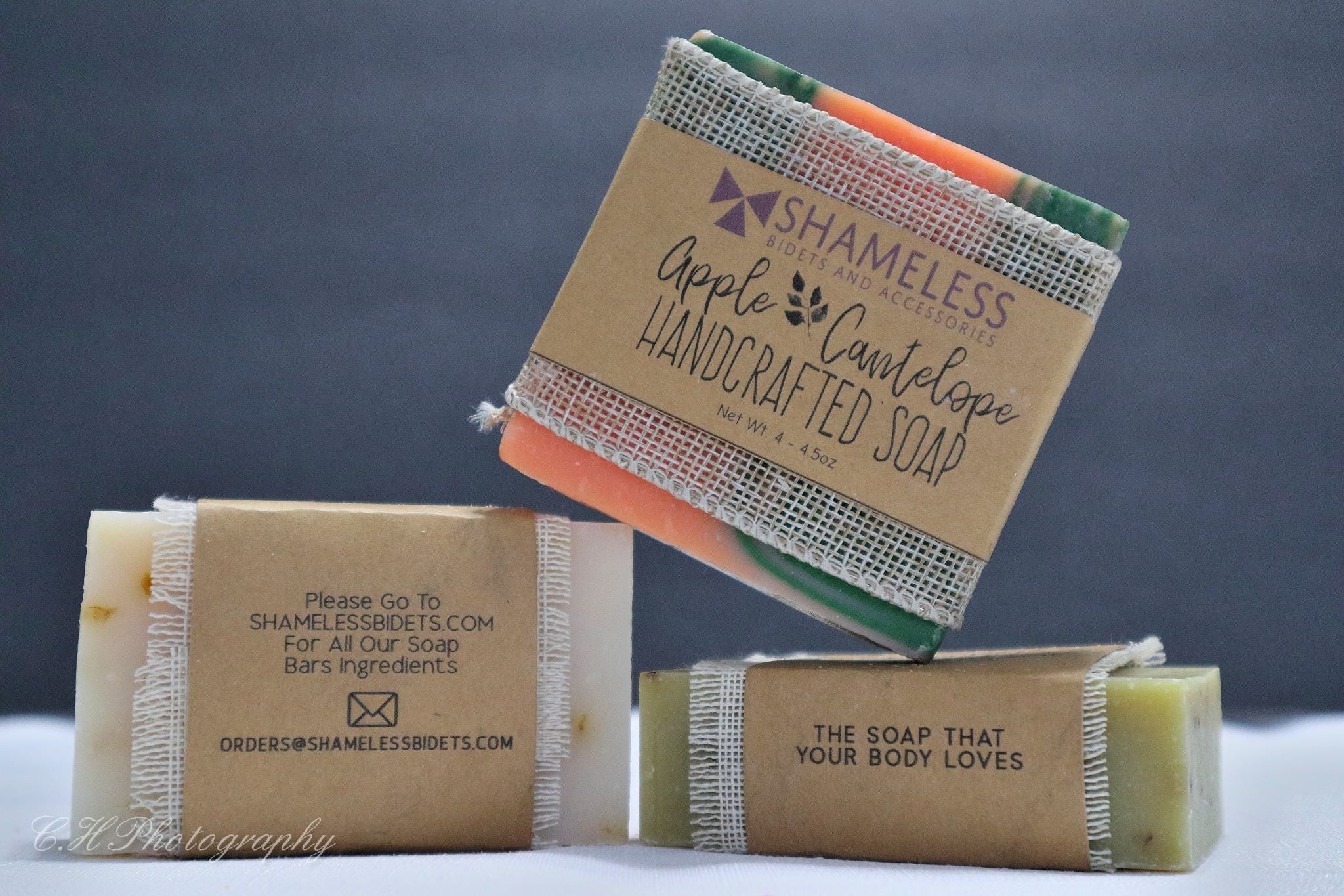 Organic Shea Butter Soap bar with natural ingredients, showcasing its creamy texture and eco-friendly packaging.