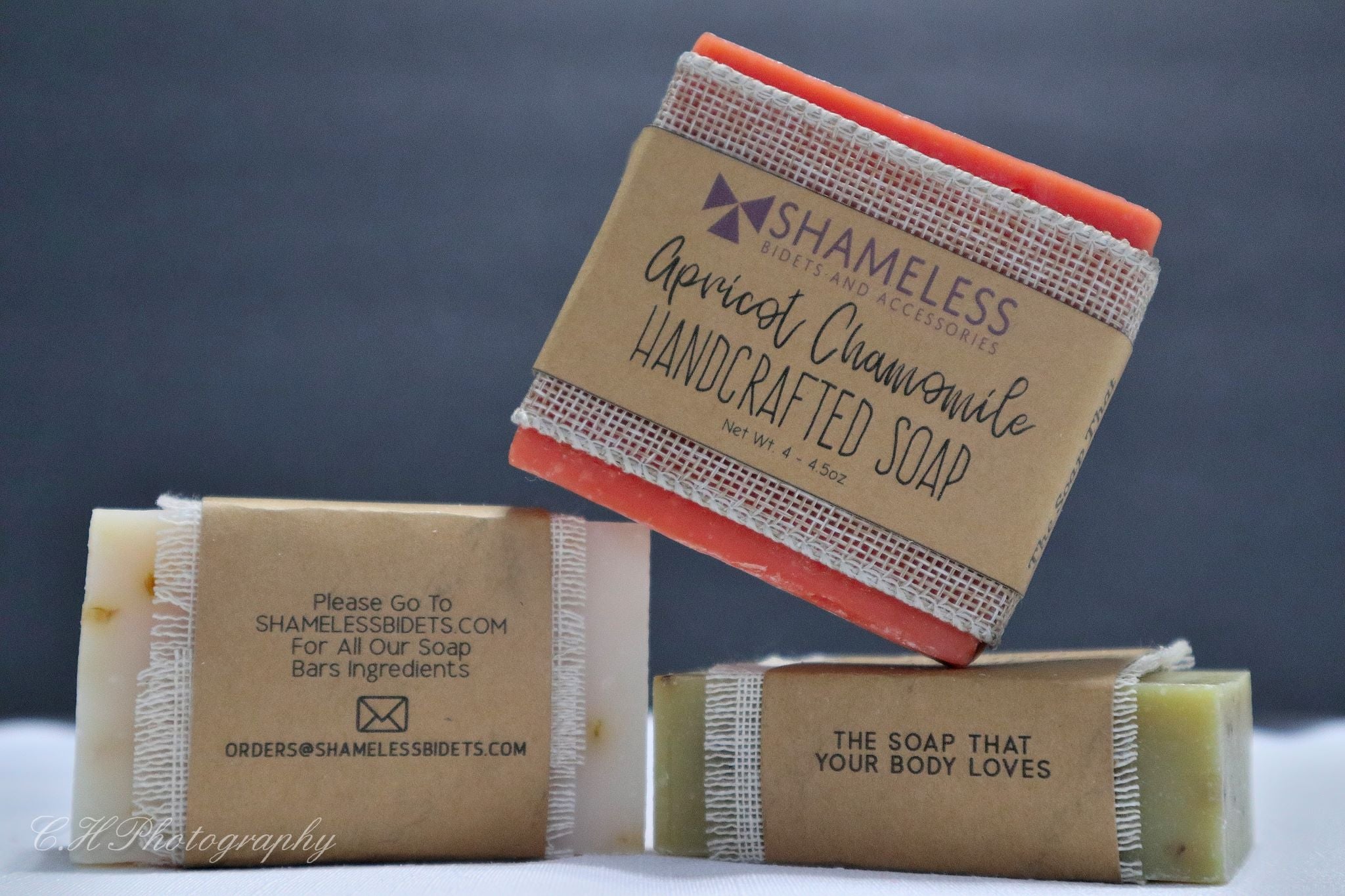 Organic Shea Butter Soap bar with natural ingredients, showcasing its creamy texture and eco-friendly packaging.