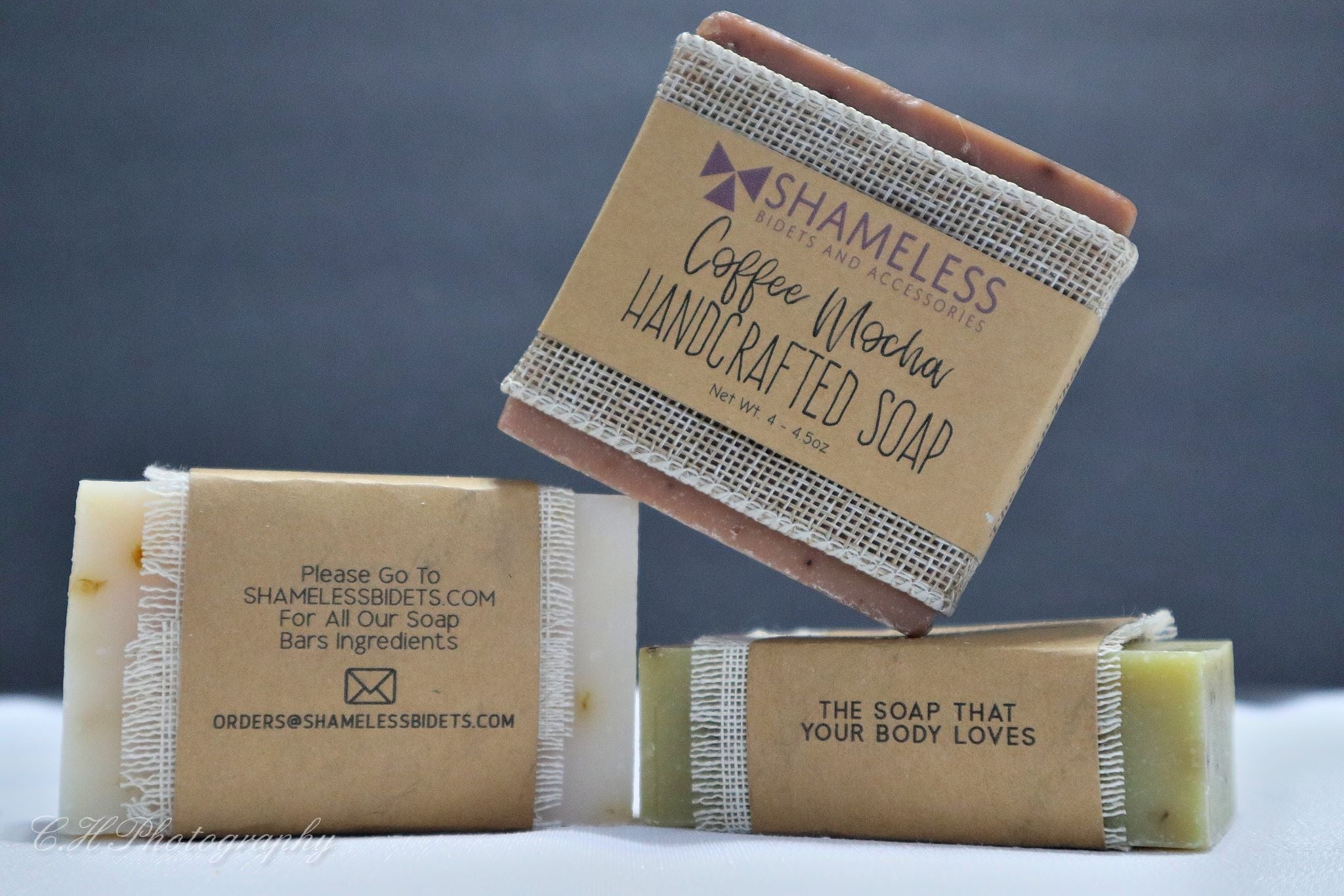 Organic Shea Butter Soap bar with natural ingredients, showcasing its creamy texture and eco-friendly packaging.