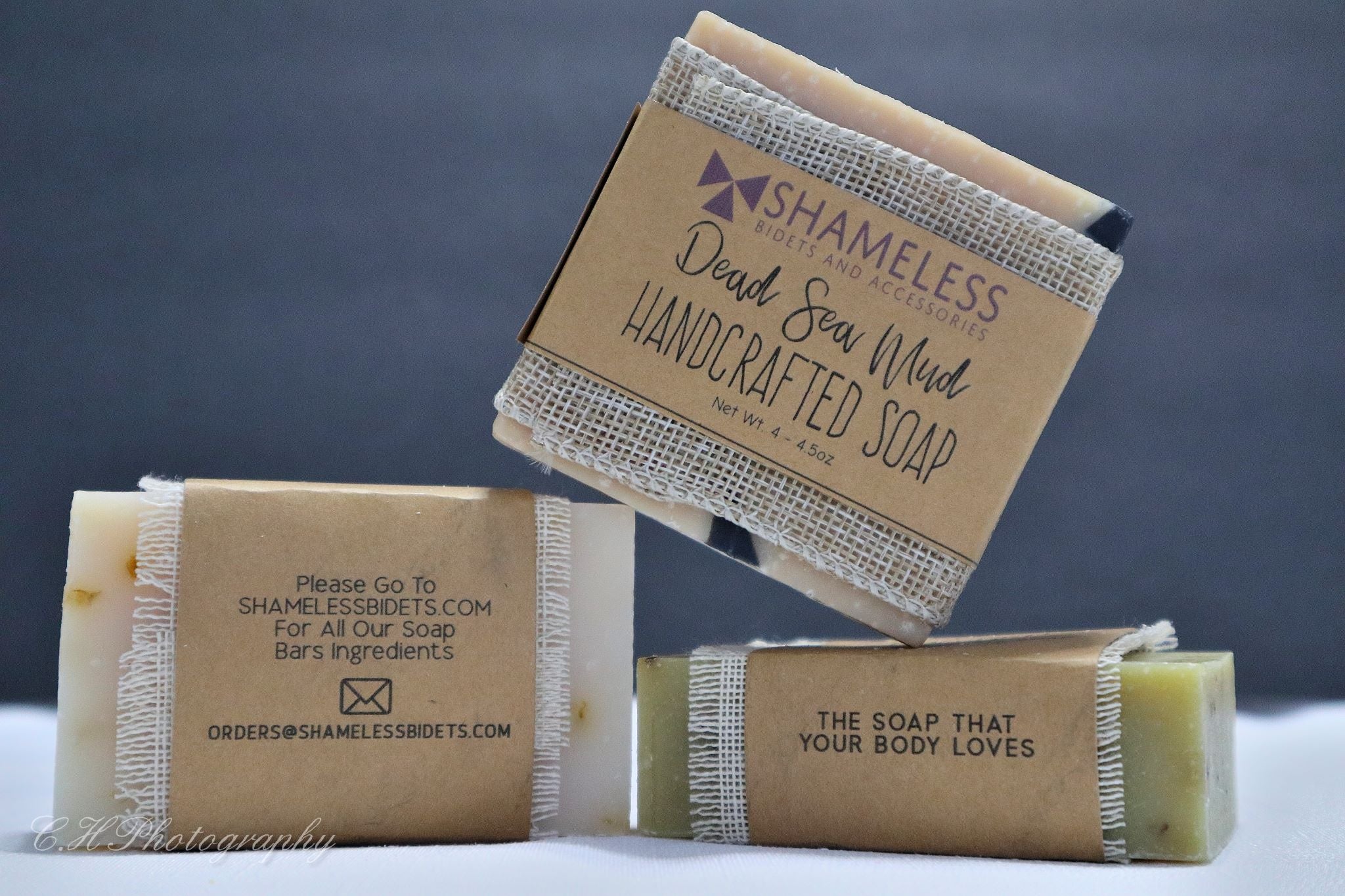 Organic Shea Butter Soap bar with natural ingredients, showcasing its creamy texture and eco-friendly packaging.