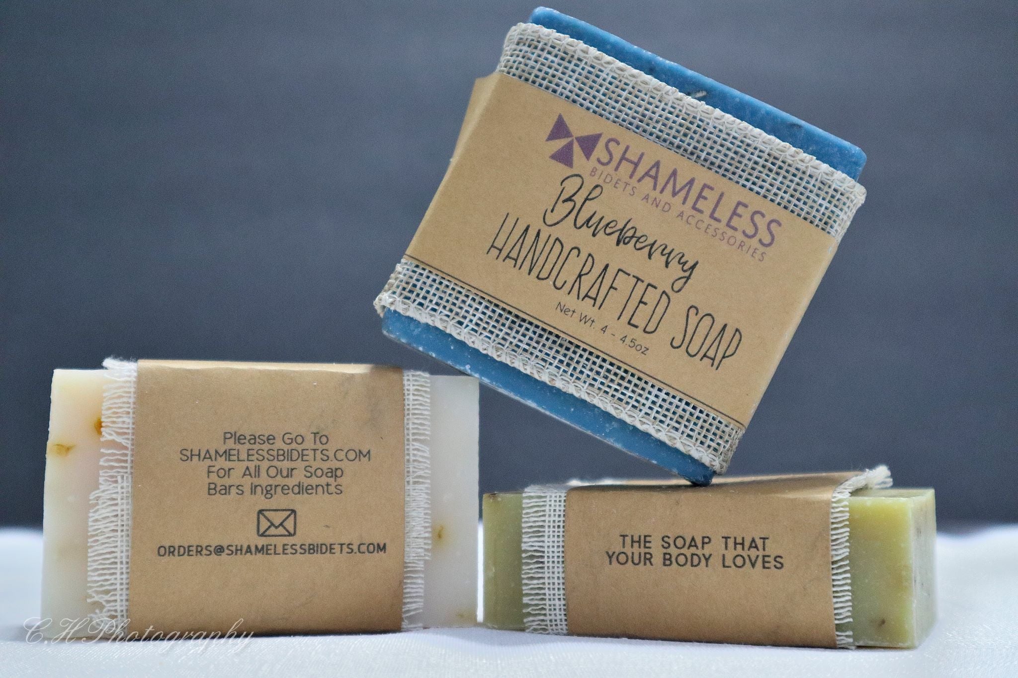 Organic Shea Butter Soap bar with natural ingredients, showcasing its creamy texture and eco-friendly packaging.