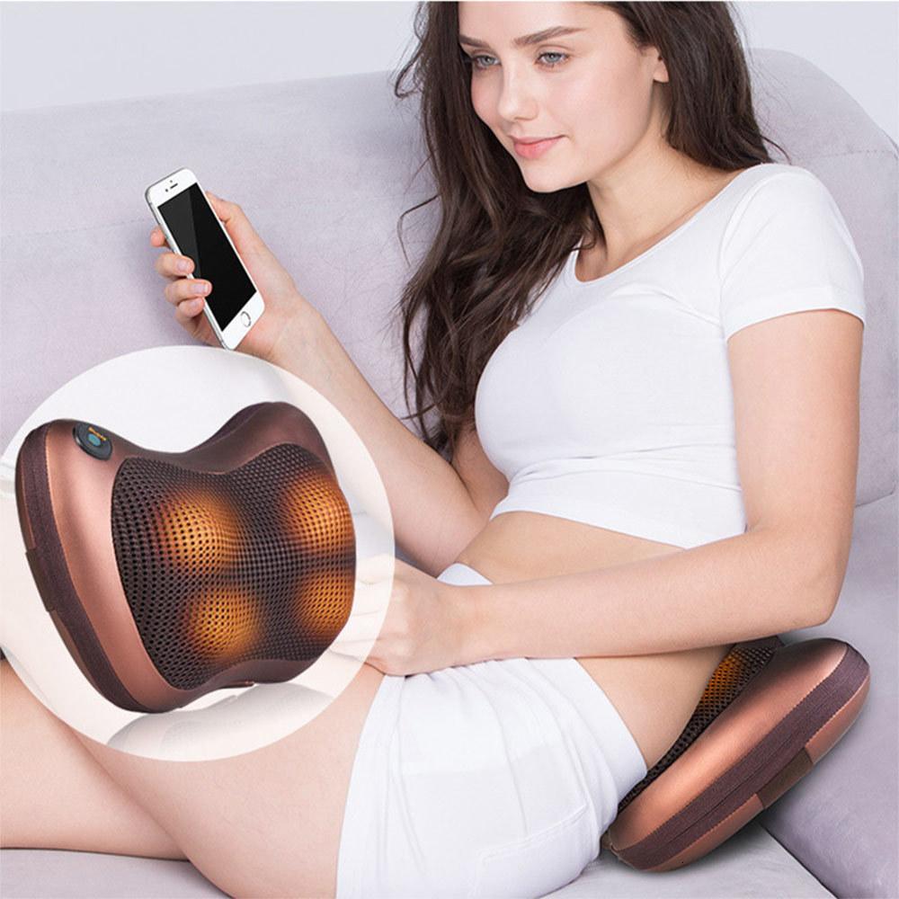 Portable 4 heads massage pillow in black, designed for neck and body relaxation with infrared warming technology.