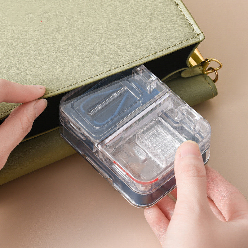 Portable Mini Packing Medicine Storage Box in red, showcasing its compact design and multifunctional features for cutting and grinding tablets.