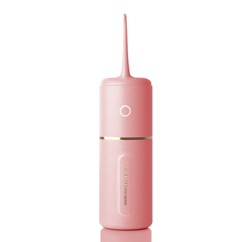 Portable Oral Irrigator Pulse Dental Water Flosser with multiple nozzles and USB charging cable, designed for effective dental cleaning.