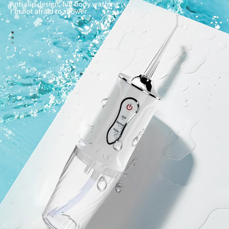 Portable Oral Irrigator Rechargeable USB Water Dental Flosser with UV sterilization, showcasing its sleek design and multiple nozzles.