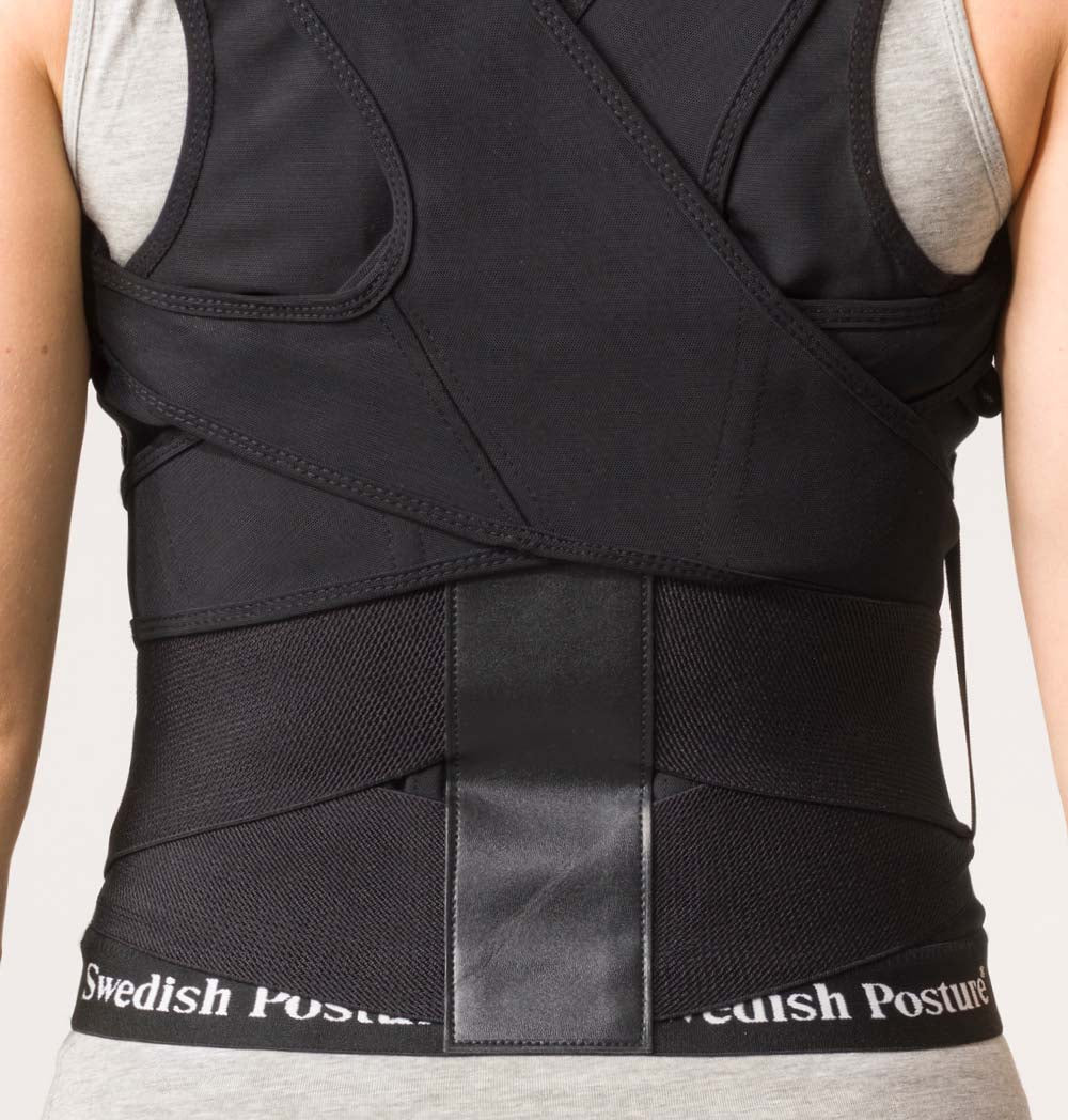 Position Posture Vest designed for back support and posture correction, featuring adjustable straps and an elongated fit for lumbar support.