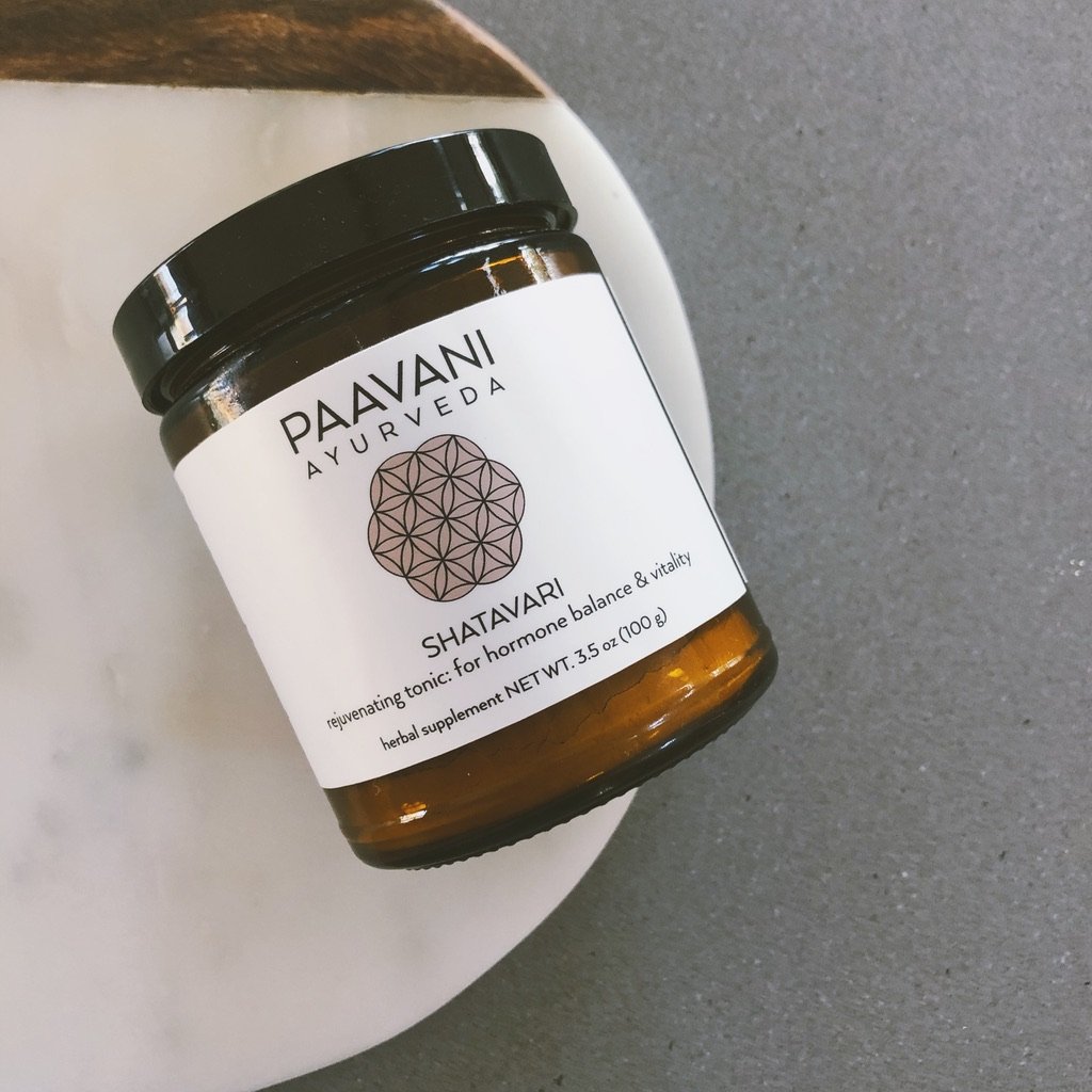 A 9 oz glass jar of Shatavari herbal supplement, showcasing its earthy color and texture, symbolizing its Ayurvedic roots and health benefits.