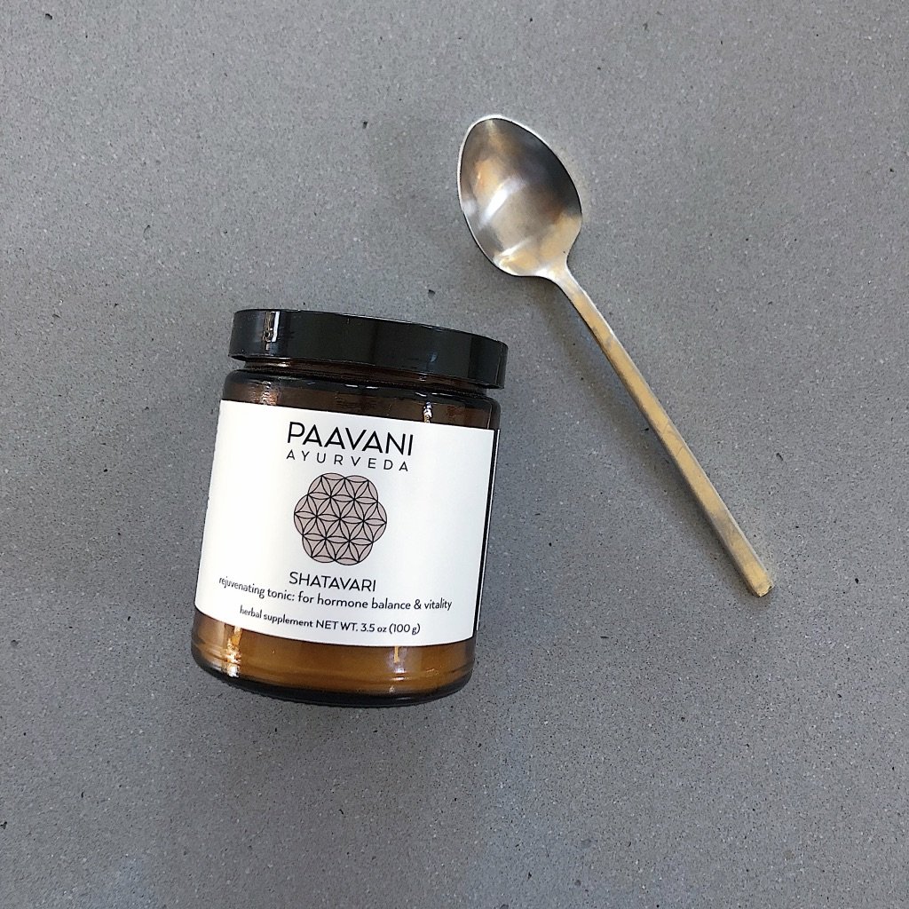 A 9 oz glass jar of Shatavari herbal supplement, showcasing its earthy color and texture, symbolizing its Ayurvedic roots and health benefits.