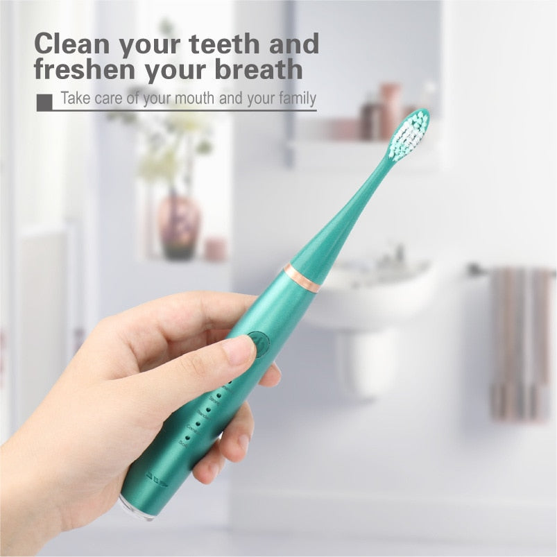 Smart Sonic Dental Scaler Electric Toothbrush with USB charging, featuring multiple heads and waterproof design for effective dental care.