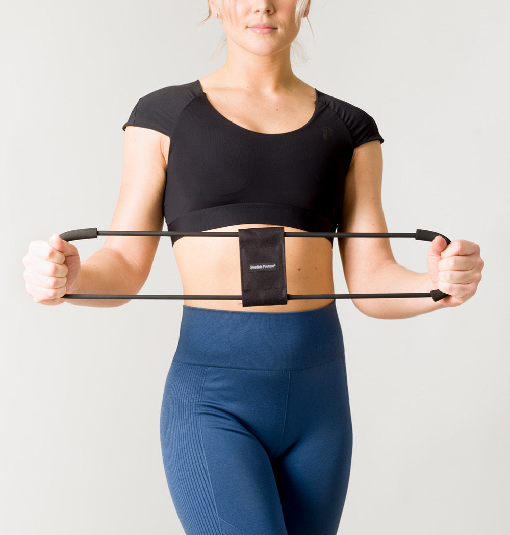 Trainer 3 in 1 device for stretching, workout, and posture correction, featuring soft handles and resistance bands.