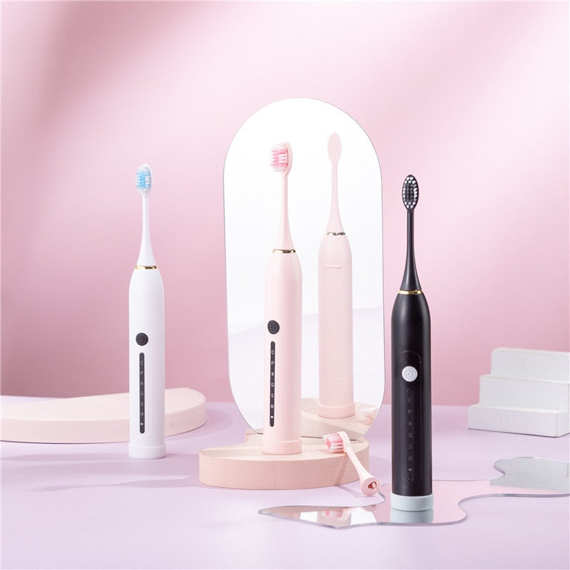 Ultrasonic Sonic Electric Toothbrush with USB charger and multiple brush heads, showcasing its sleek design and advanced features.