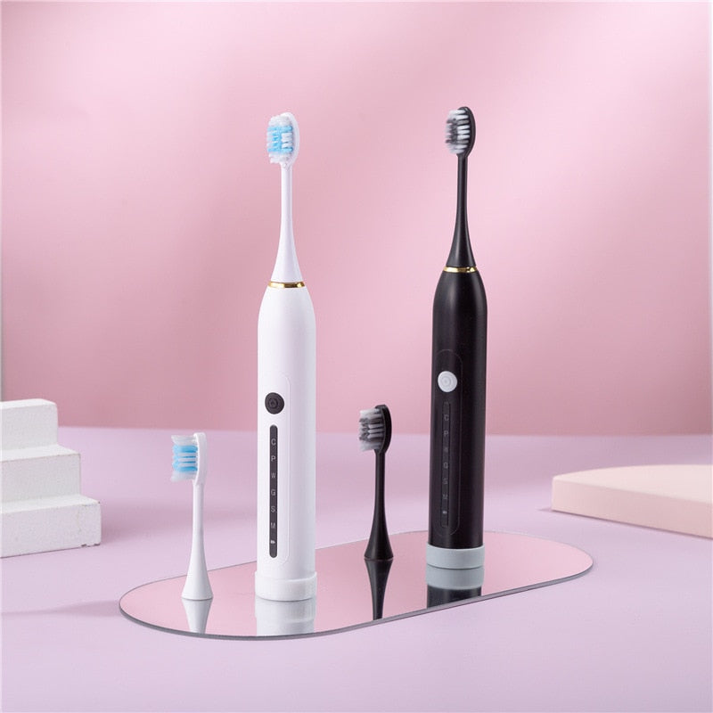 Ultrasonic Sonic Electric Toothbrush with USB charger and multiple brush heads, showcasing its sleek design and advanced features.