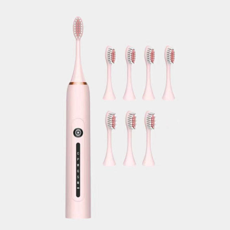 Ultrasonic Sonic Electric Toothbrush with USB charger and multiple brush heads, showcasing its sleek design and advanced features.