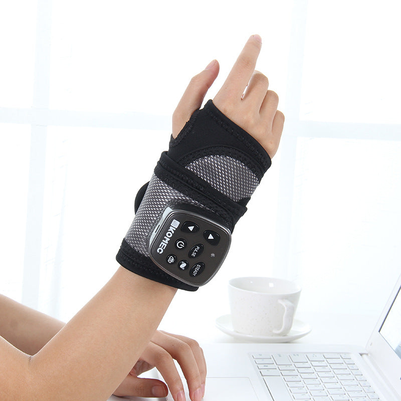 Wireless Vibration Physical Therapy Heating Wrist Massager in black and gray, showcasing its ergonomic design and user-friendly operation panel.