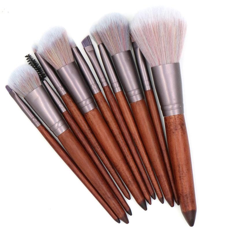 11 Pieces High Quality Makeup Brush Set featuring synthetic hair bristles, matte coffee aluminum ferrules, and natural wood handles.