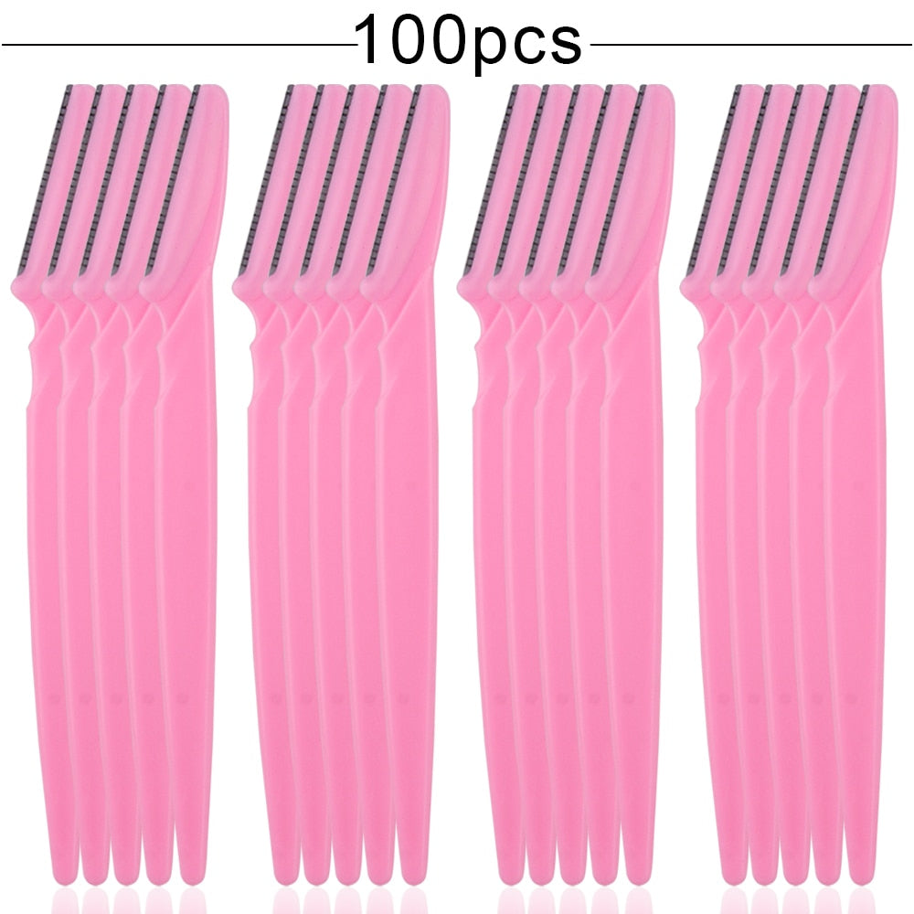 100Pcs Eyebrow Cutting Knife Blades in various colors, showcasing their sleek design and stainless steel blades for precise eyebrow shaping.