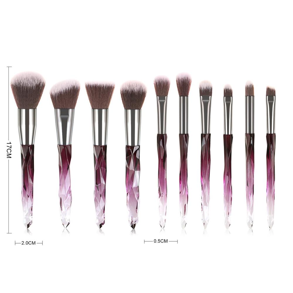 A set of 10 transparent crystal diamond makeup brushes with colorful handles, showcasing their elegant design and high-quality bristles.