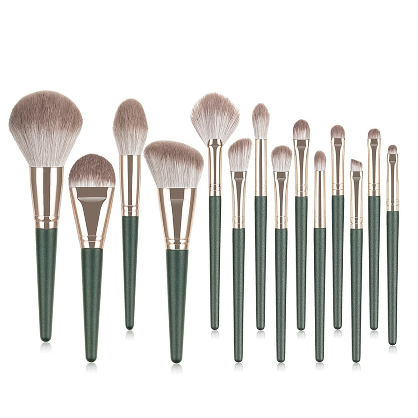 14-piece Green Cloud Makeup Brushes Set with wooden handles and nylon bristles, neatly arranged in a leather bag.