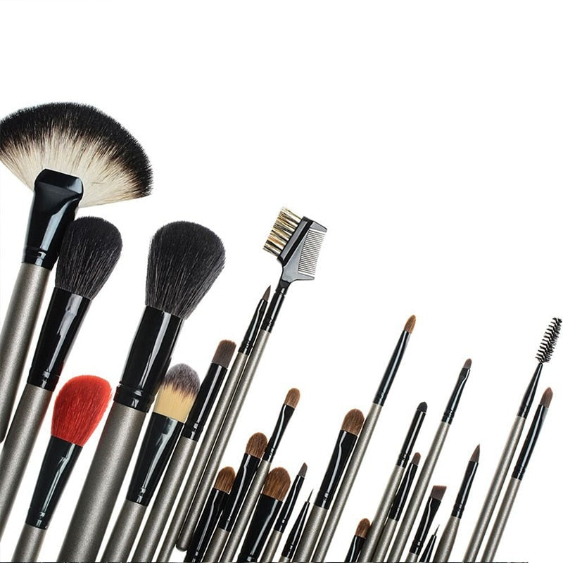 A complete set of 26 high-quality makeup brushes displayed in a stylish leather holder case, showcasing various brush shapes and sizes.