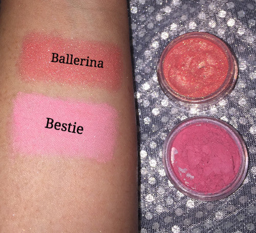 Ballerina Pigment Blush loose powder in a stylish container, showcasing its soft and shimmery texture.