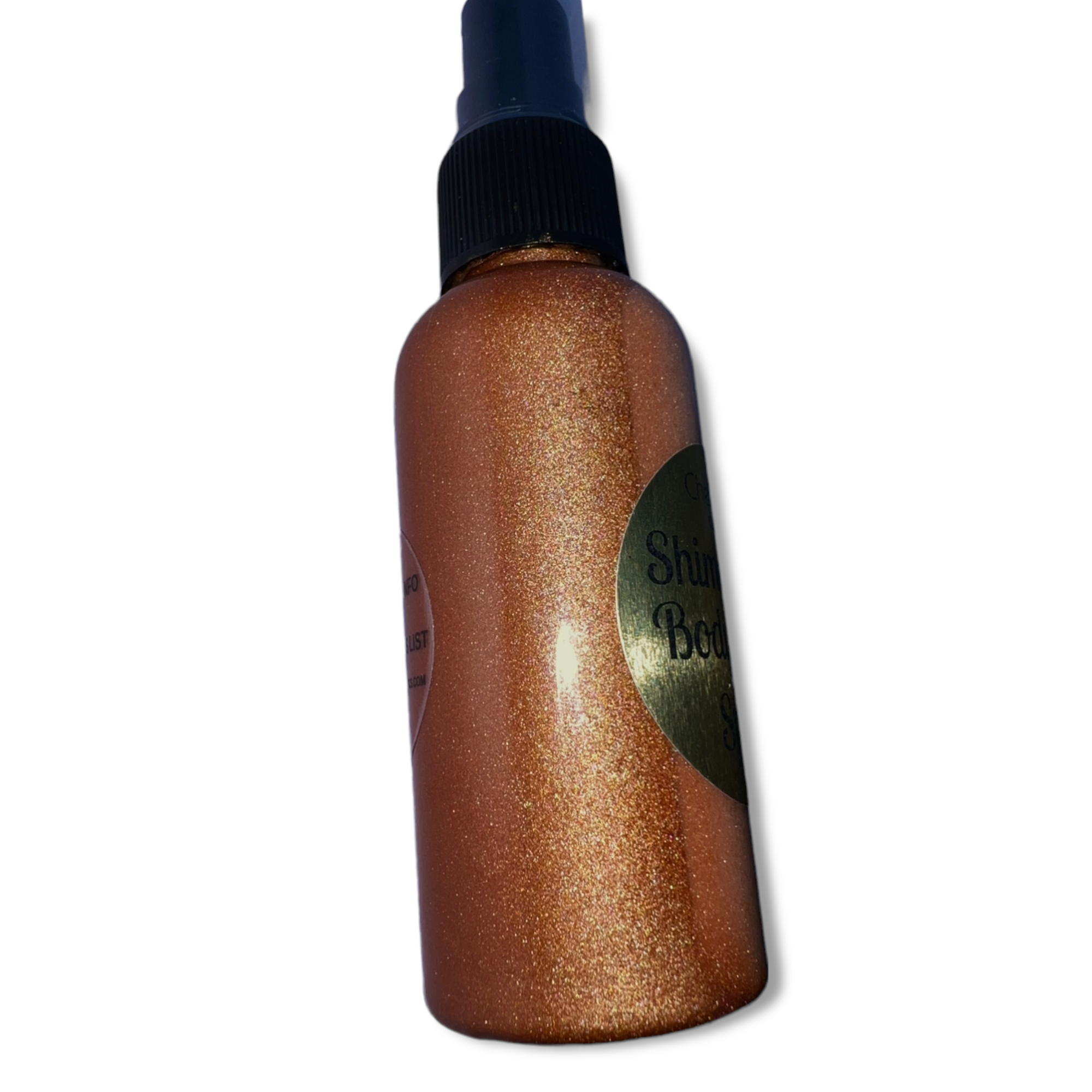 A bottle of Bronze Goddess Shimmering Body Glow Spray with a golden bronze hue, showcasing its elegant design and shimmering contents.