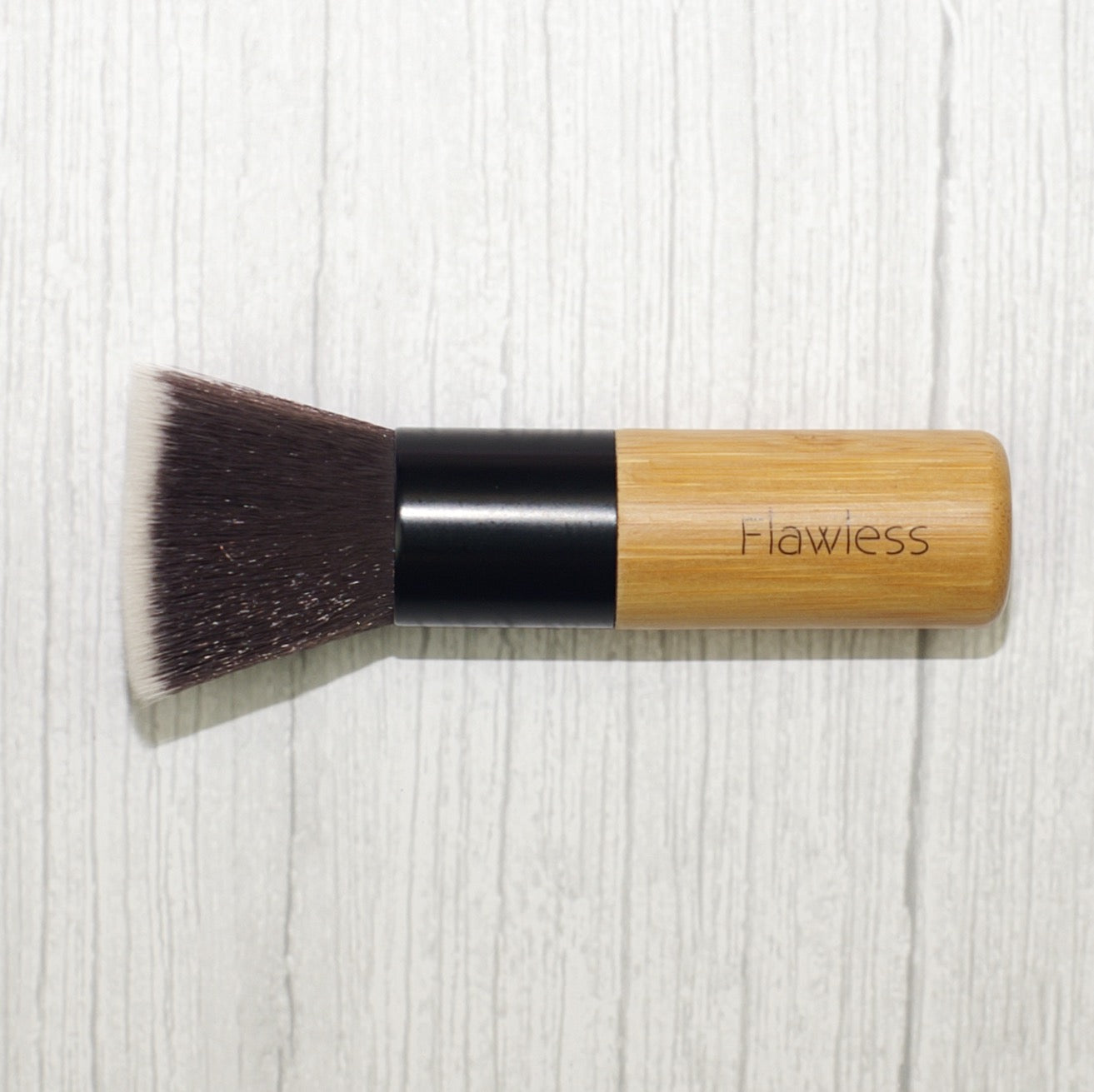 Buffing Foundation Brush with densely packed soft bristles for flawless makeup application.