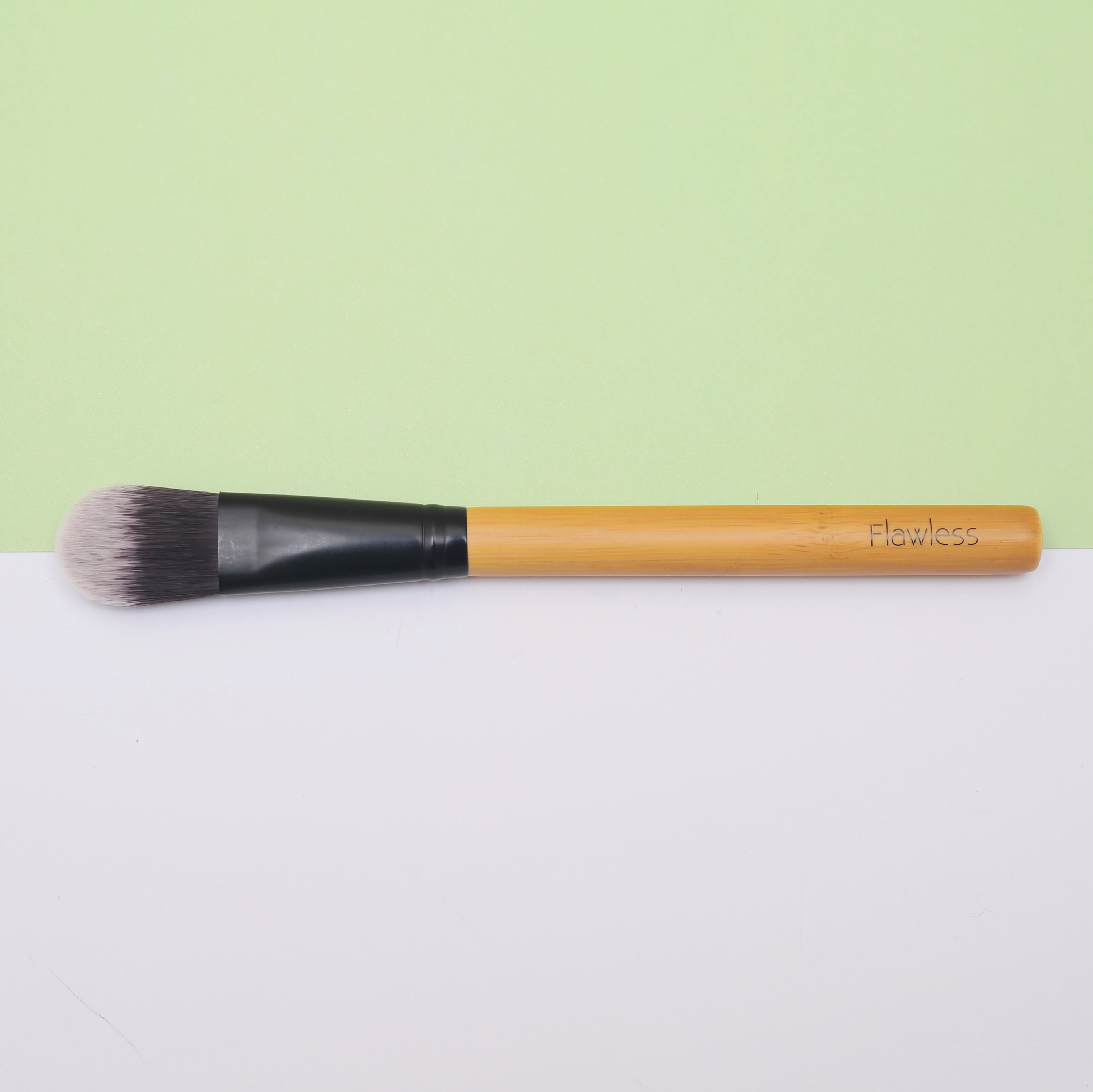 Classic Foundation Brush designed for seamless foundation application and contouring, featuring a flattened shape for precision.