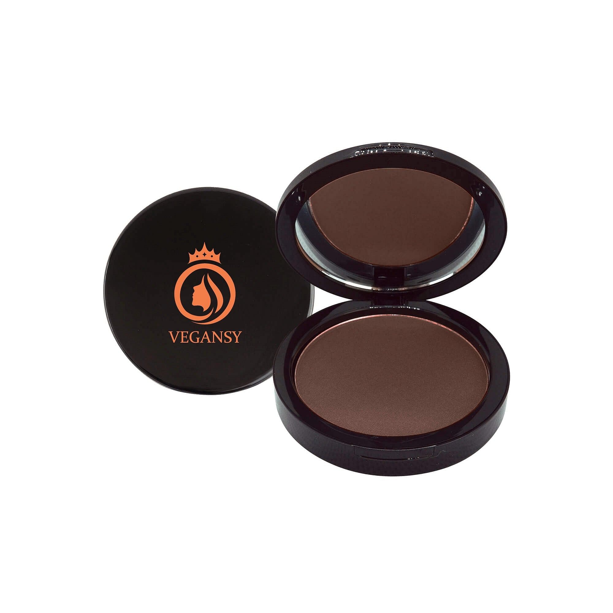 A compact of Dual Blend Powder Foundation in Fig, showcasing its sleek design and powder texture, ideal for adjustable coverage.