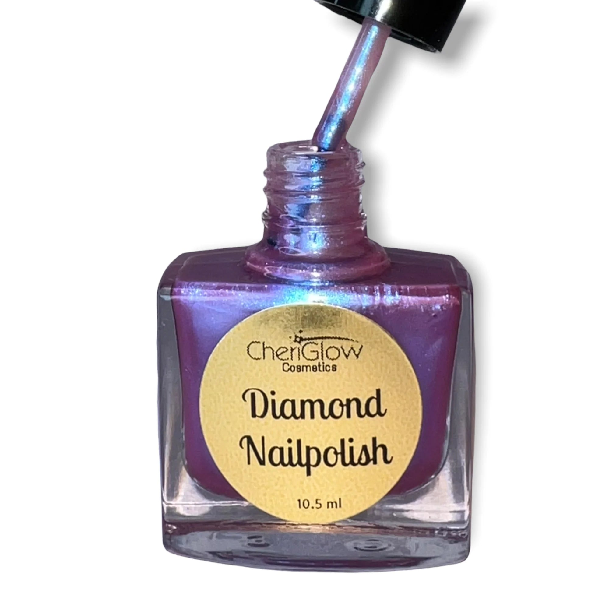 Bottle of Extraterrestrial Diamond Nail Polish showcasing its triple chrome effect with shifts of pink, blue, and red.