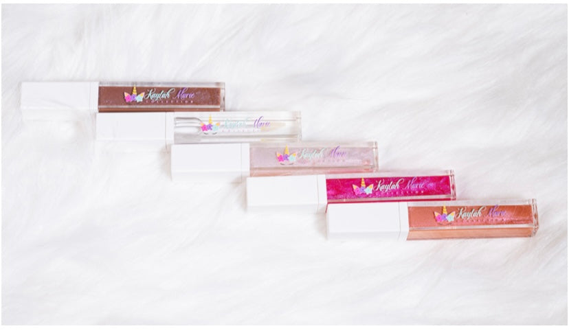 Girls Glitter Lip Gloss in six vibrant shades, showcasing sparkle and shine, perfect for young beauty lovers.