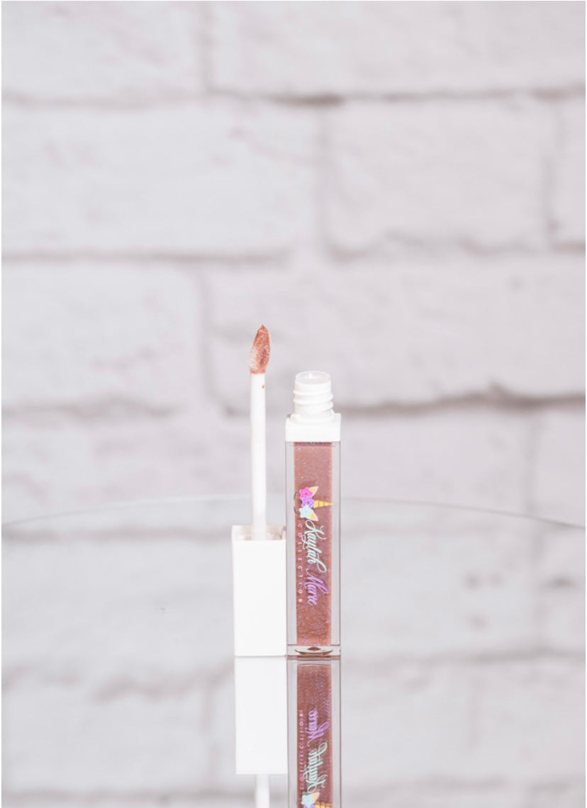 Girls Glitter Lip Gloss in six vibrant shades, showcasing sparkle and shine, perfect for young beauty lovers.