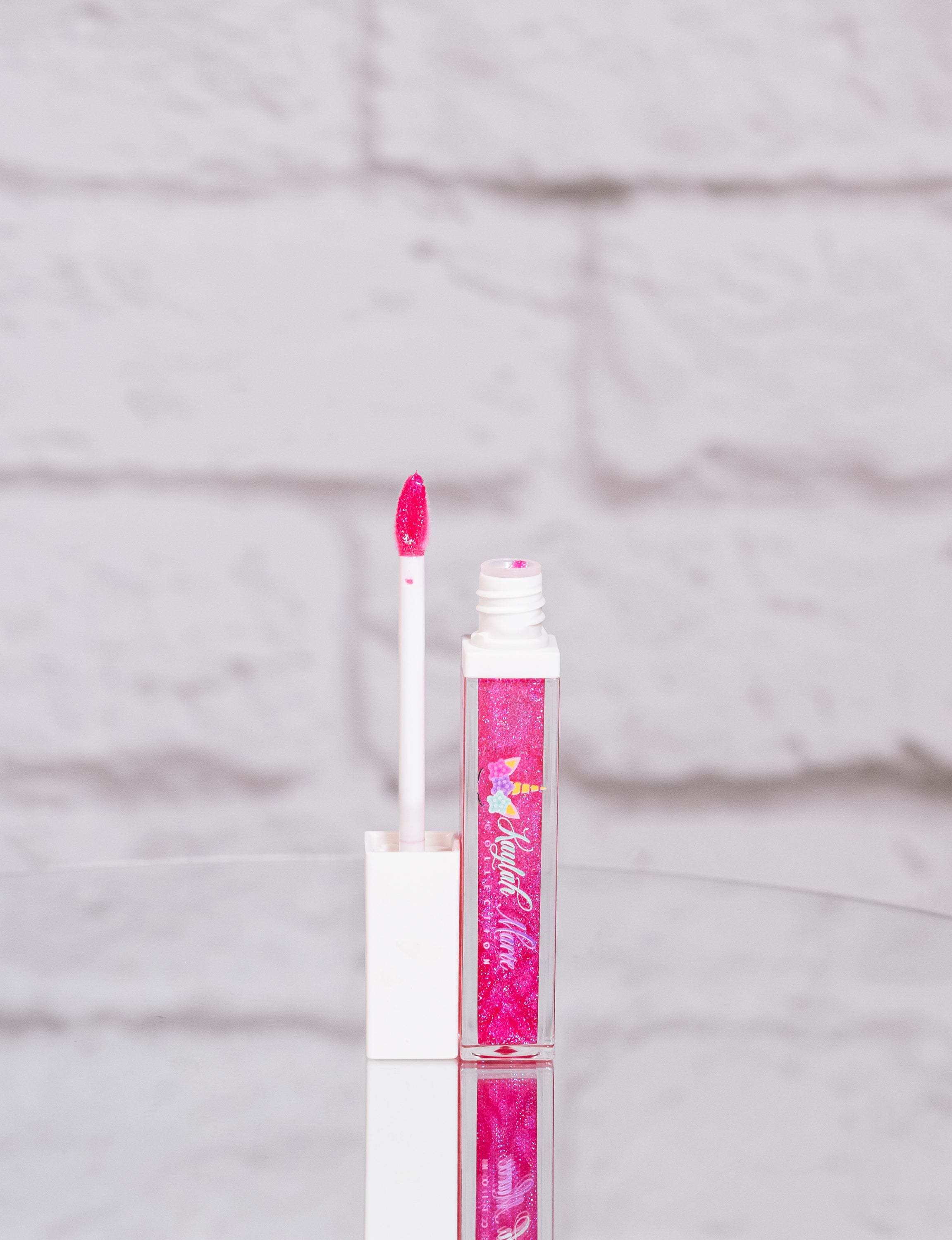 Girls Glitter Lip Gloss in six vibrant shades, showcasing sparkle and shine, perfect for young beauty lovers.