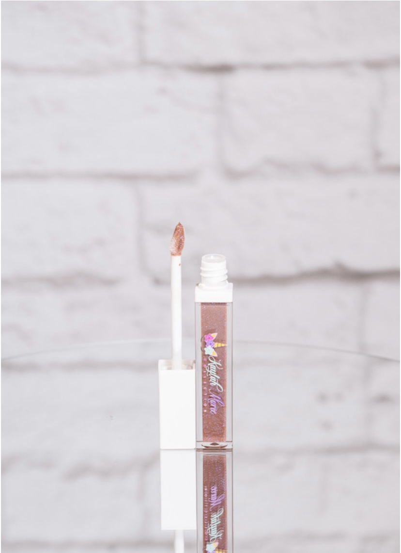 Girls Glitter Lip Gloss in vibrant shades with sparkling finish, perfect for young beauty enthusiasts.