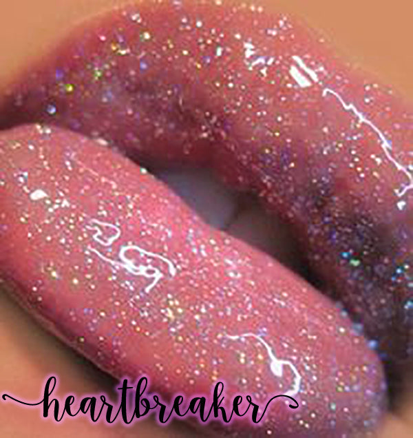 Heartbreaker - XO Royalty Lipgloss showcasing a shimmering glitter effect in various colors.