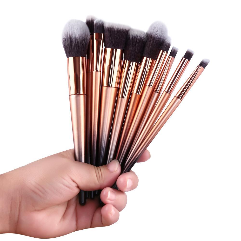 High Quality 10pcs Makeup Brush Set featuring durable plastic handles and soft man-made fiber bristles for flawless makeup application.