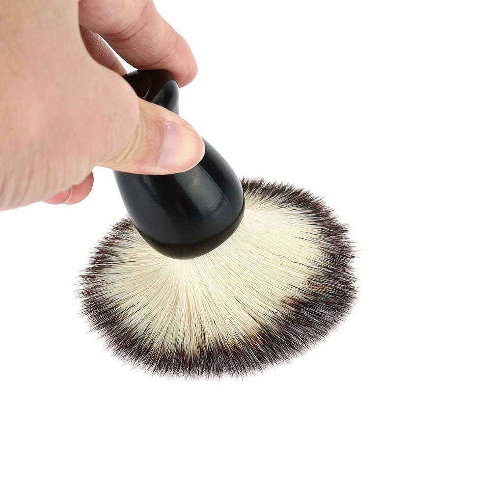 High quality black non-shedding shaving brush with rubber plastic handle, designed for optimal lathering and comfort.