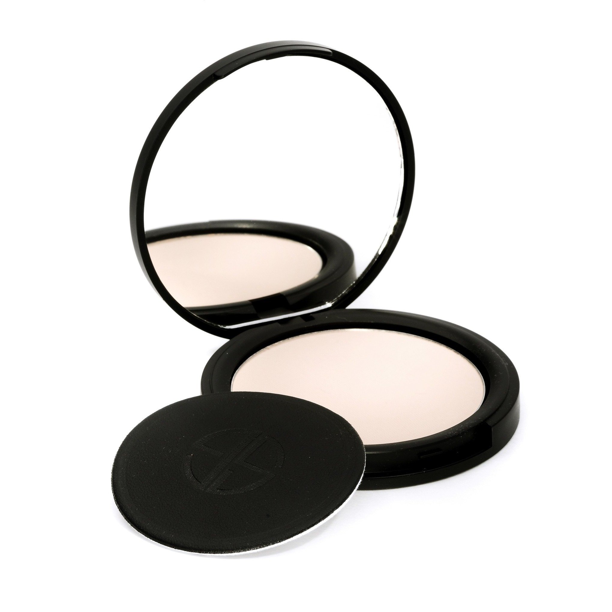 Studio Gear Cosmetics Invisible Pressed Powder compact with a sleek design, showcasing the ultra-sheer powder inside.