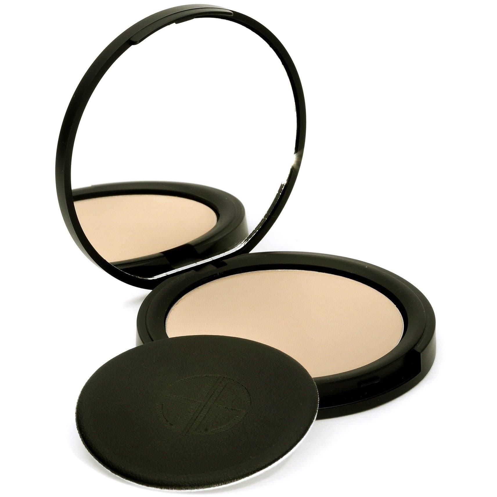 Studio Gear Cosmetics Invisible Pressed Powder compact with a sleek design, showcasing the ultra-sheer powder inside.