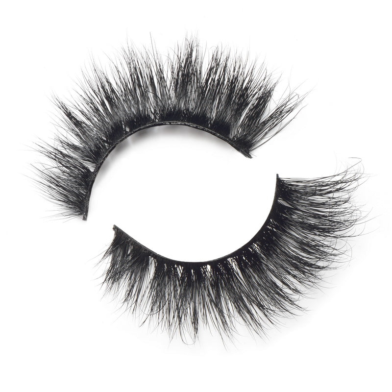 A pair of luxurious LOLA Mink Lashes made from 100% real mink fur, showcasing their wispy and 3D design.