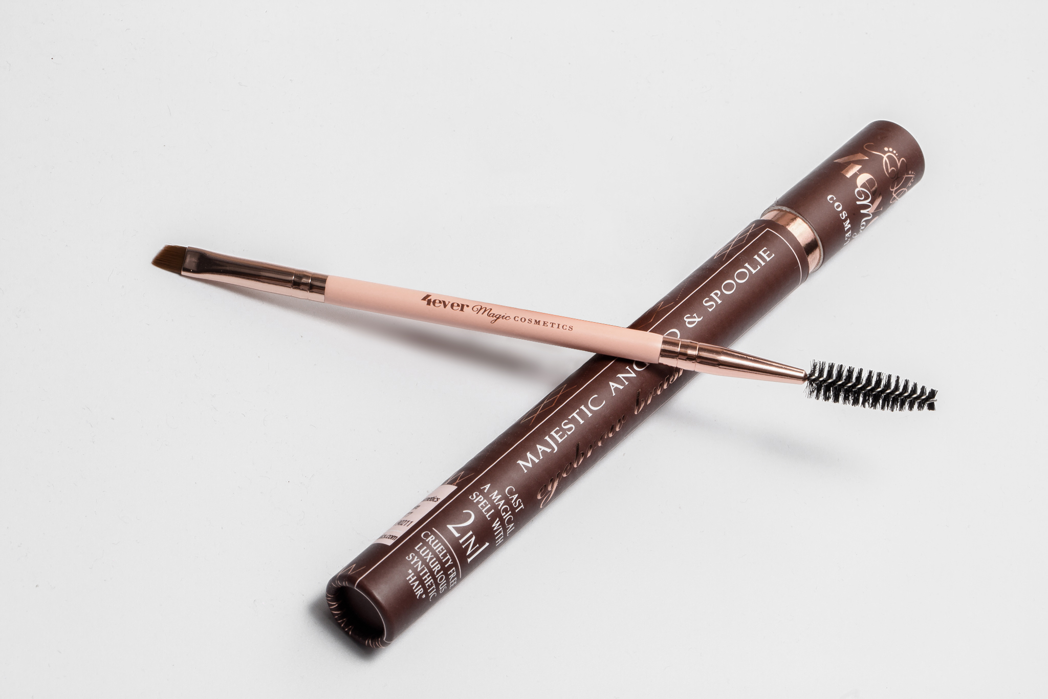 Majestic Angled and Spoolie Eyebrow Brush featuring luxurious synthetic bristles for precise eyebrow grooming and blending.