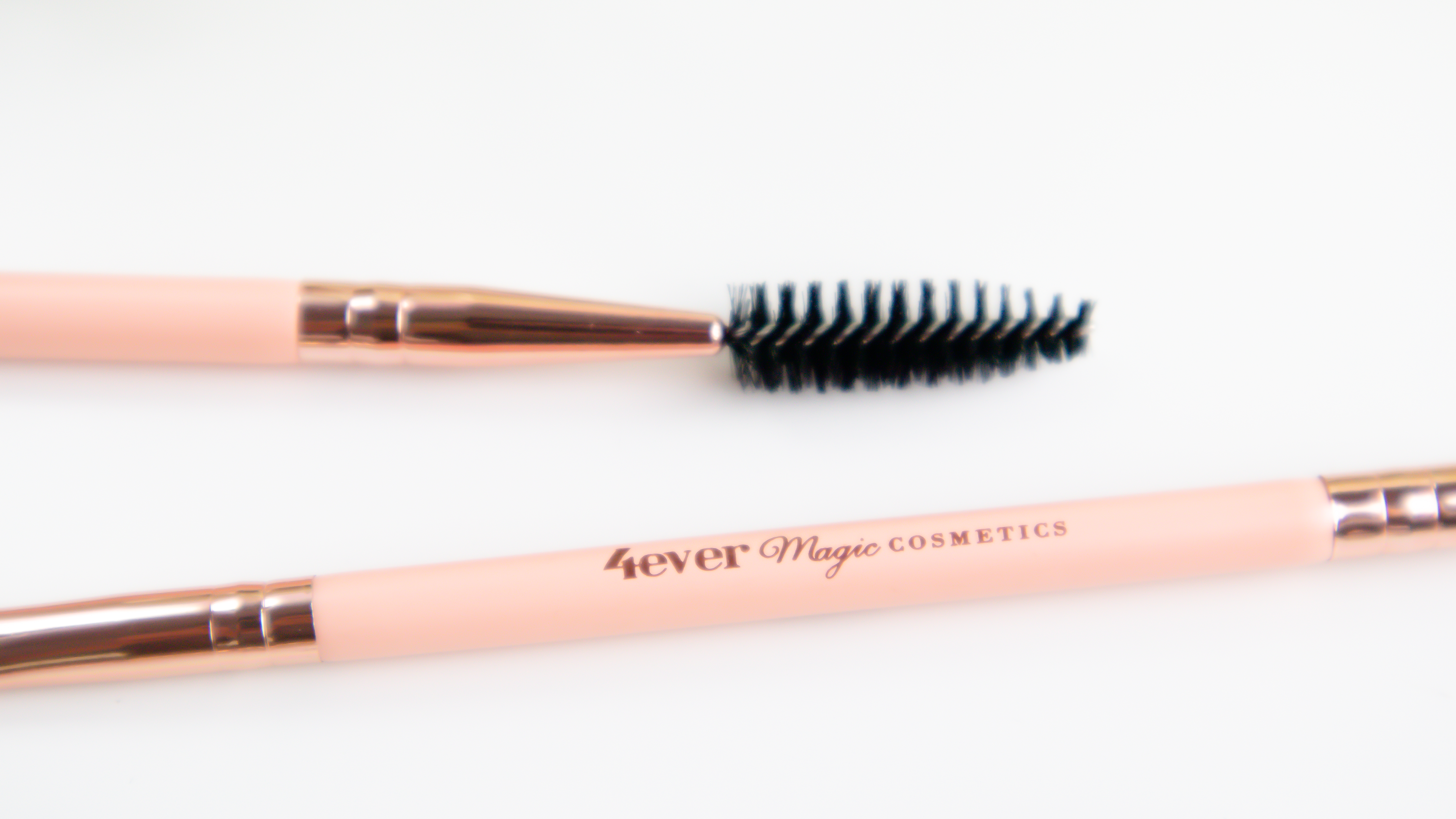 Majestic Angled and Spoolie Eyebrow Brush featuring luxurious synthetic bristles for precise eyebrow grooming and blending.