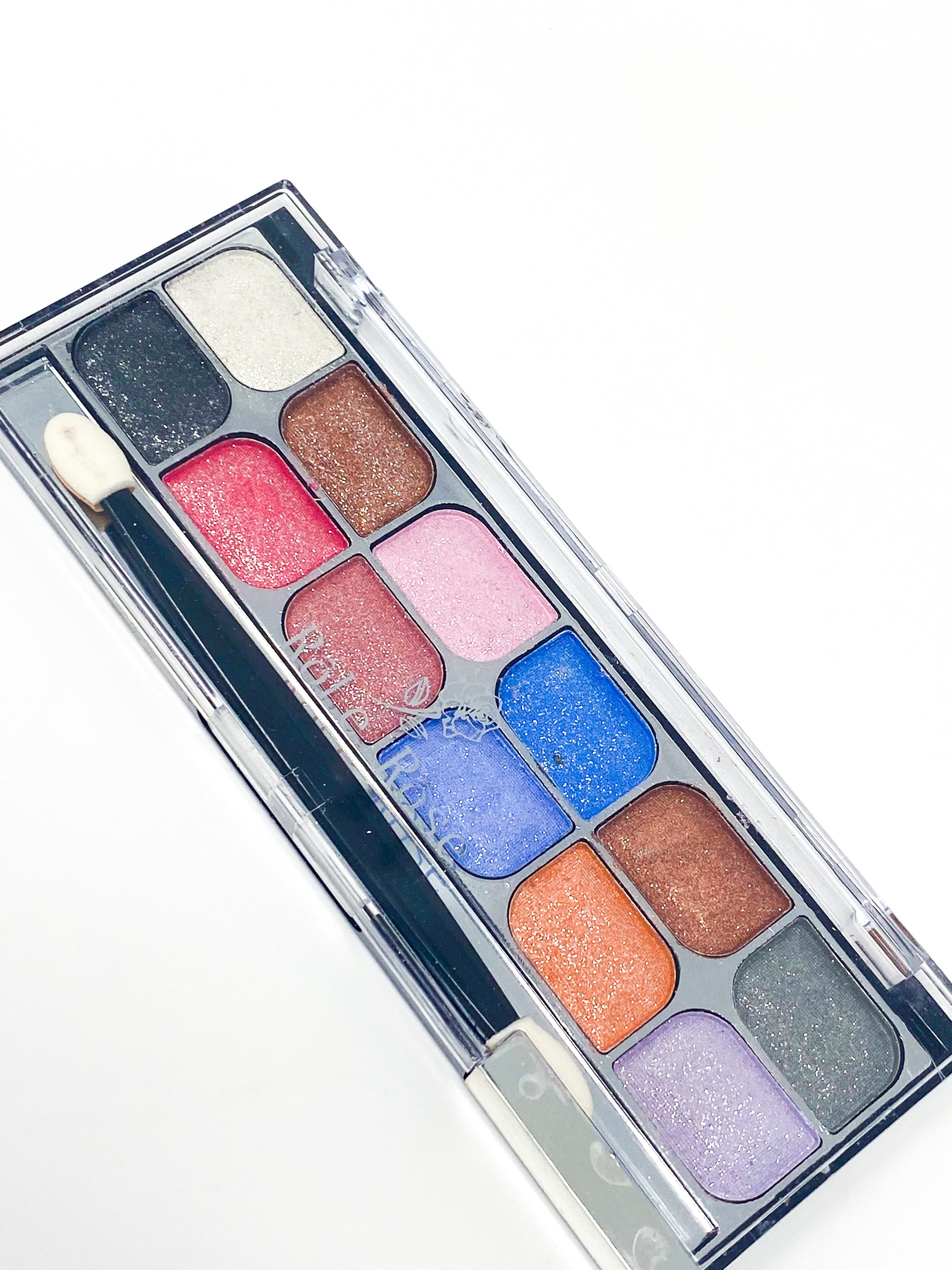 12 Rich Pigment Eye Shadow Palette X3 showcasing vibrant colors and high shimmer finishes, perfect for creating stunning eye looks.