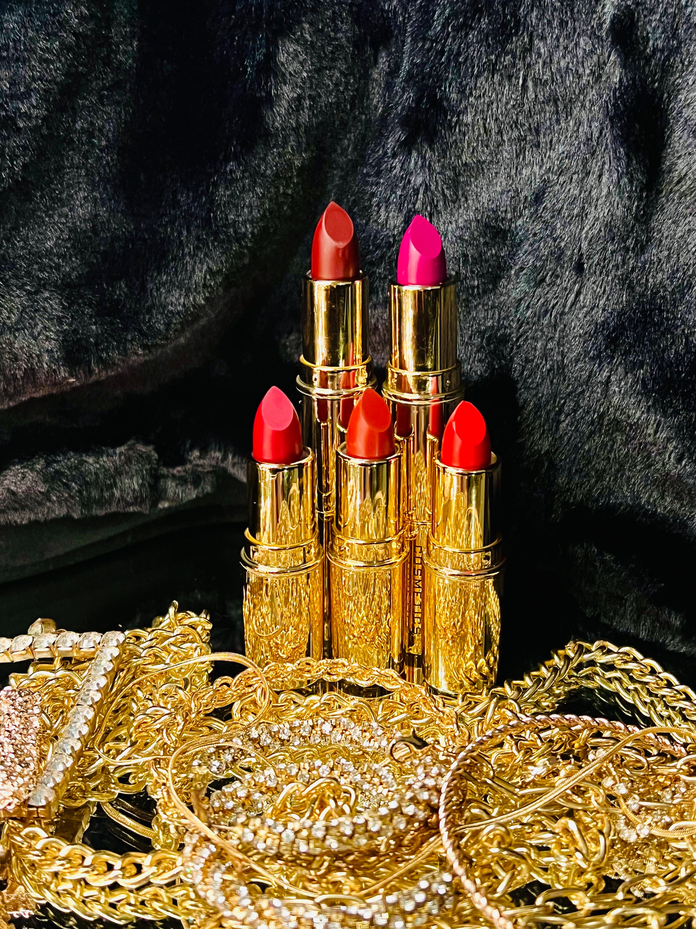 A collection of Matte Lipsticks in various shades, showcasing their sleek packaging and vibrant colors.