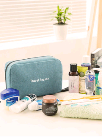 Portable Travel Hook Multifunction Makeup Bag with multiple pockets and a hanging hook, ideal for organizing cosmetics and toiletries.